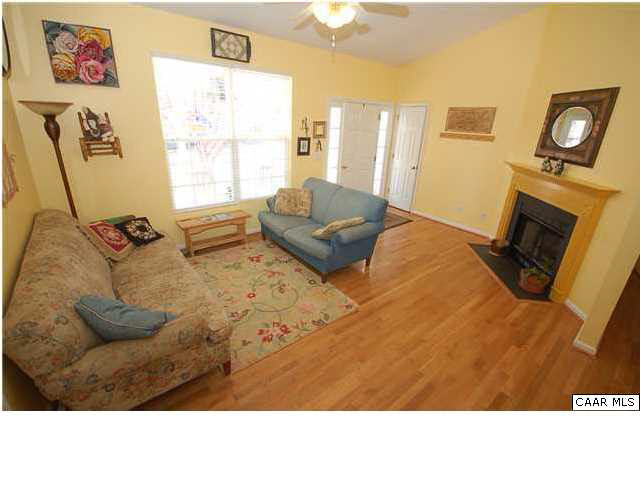 545 Jonquil Road Ruckersville, VA 22968 - Photo 8 of 26 a living room with furniture and a flat screen tv