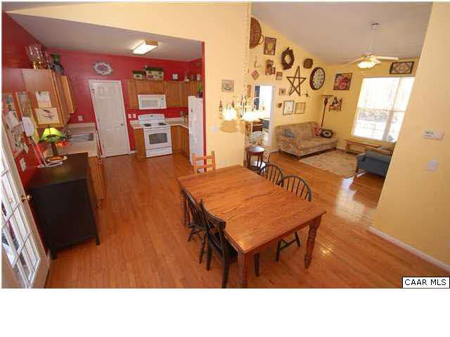 545 Jonquil Road Ruckersville, VA 22968 - Photo 10 of 26 a living room with furniture and wooden floor
