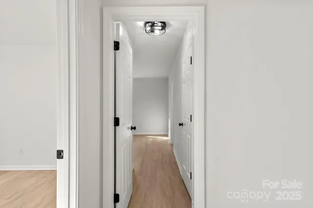 a view of a hallway with closet