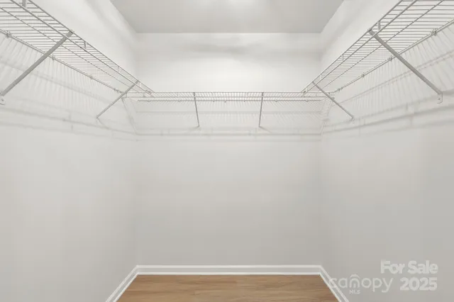 a view of a room with racks on the wall