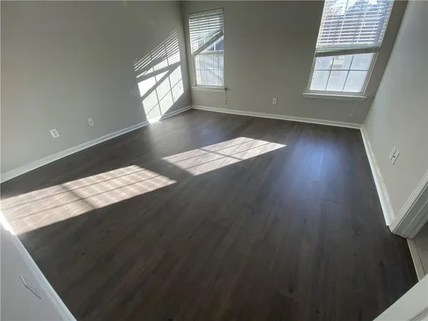 a view of an empty room and window