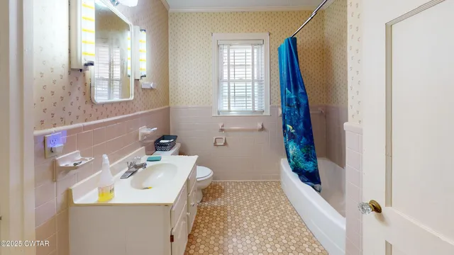 a bathroom with a sink and a shower