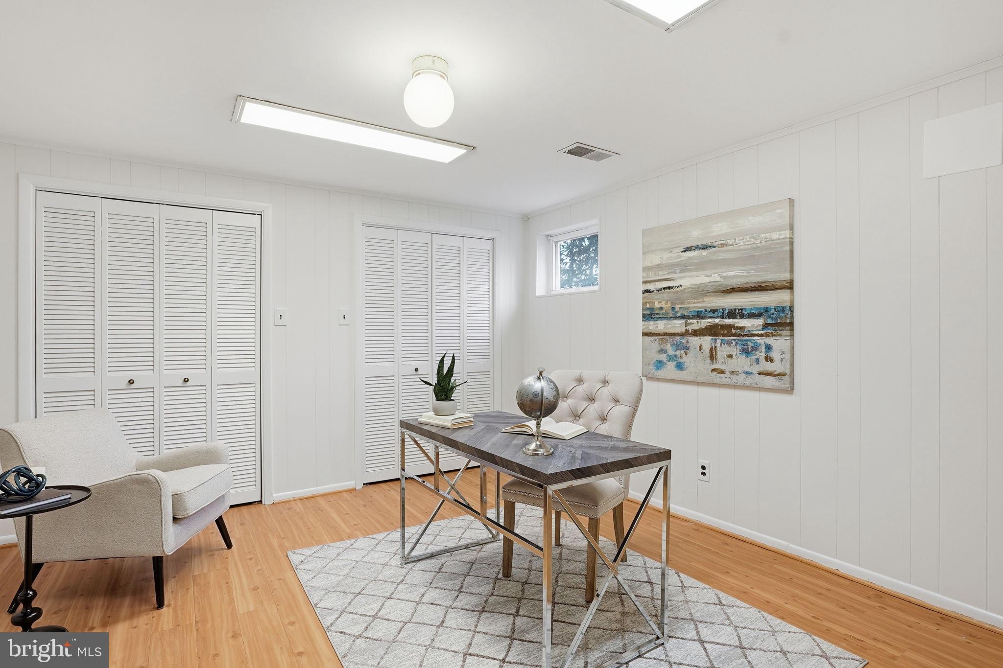 8200 Beech Tree Road Bethesda, MD 20817 - Photo 22 of 29 a living room with furniture and wooden floor