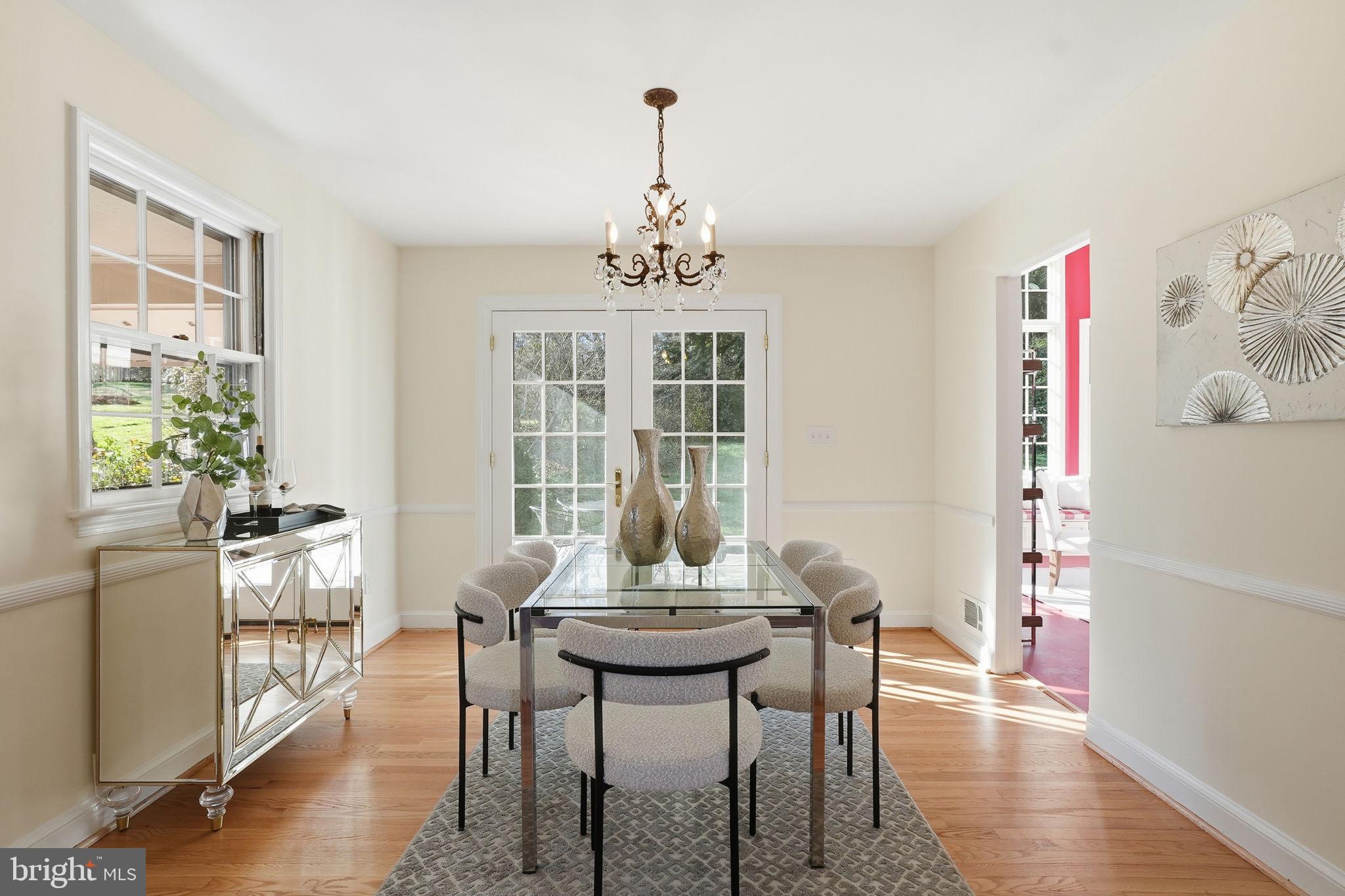 8200 Beech Tree Road Bethesda, MD 20817 - Photo 8 of 29 a view of a dining room with furniture and wooden floor
