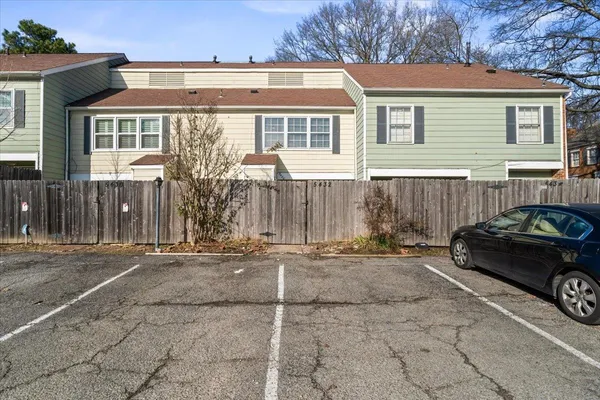 a car parked in front of a house