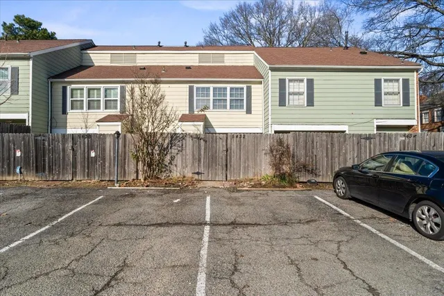 a car parked in front of a house
