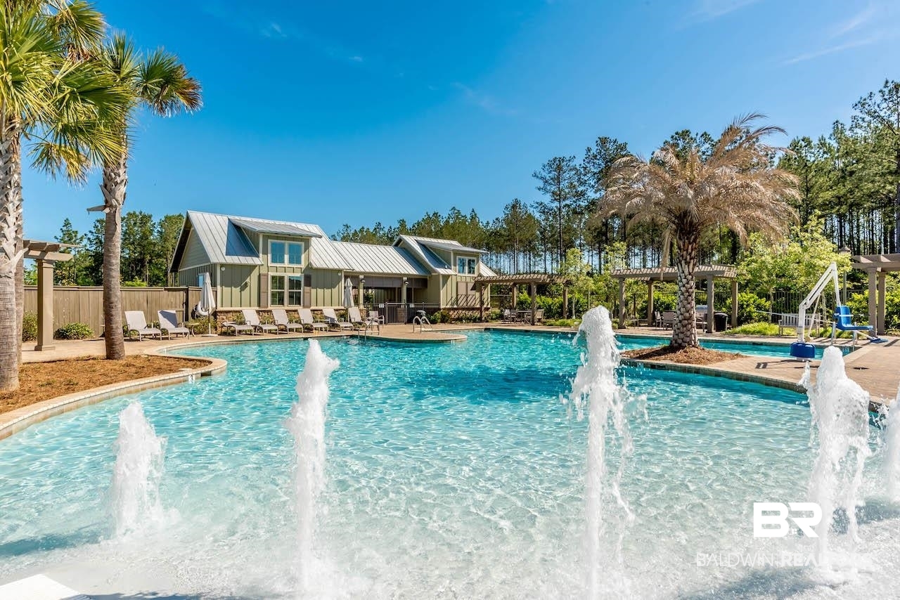 13645 Antler Hl Road Daphne, AL 36527 - Photo 32 of 41 Community pool featuring a patio area