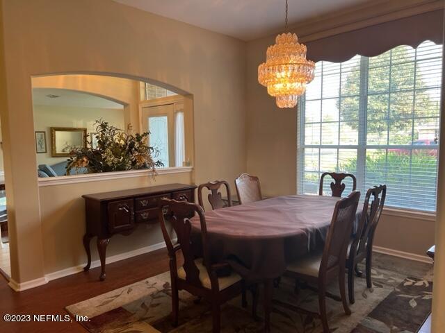 10321 Sugar Grove Road Jacksonville, FL 32221 - Photo 12 of 34 a dining room with furniture and window