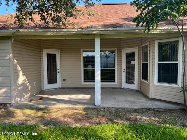 10321 Sugar Grove Road Jacksonville, FL 32221 - Photo 29 of 34 a front view of a house with a yard