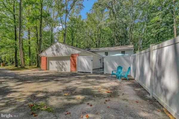 a house with a trees in front of it