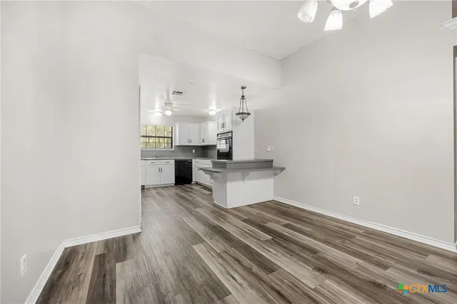 a view of kitchen and sink