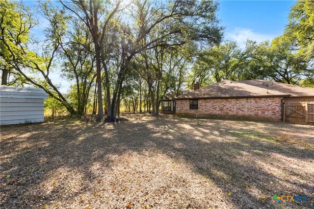 a view of outdoor space and yard