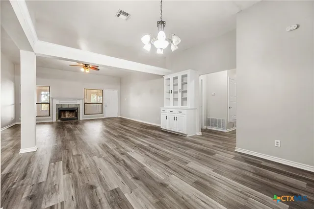 a view of a livingroom with wooden floor