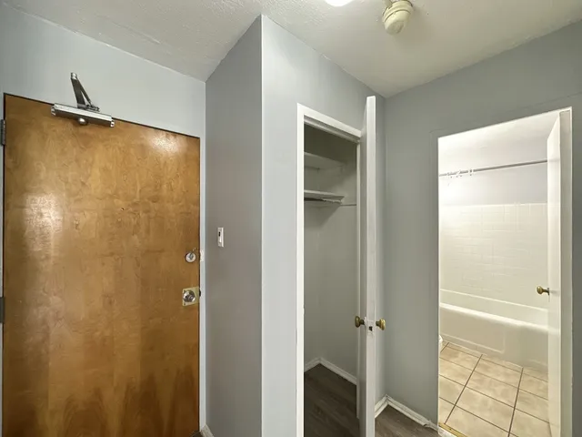 a bathroom with a sink a bath tub and shower