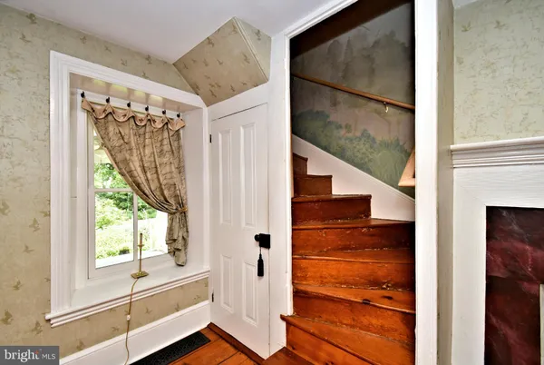 a kitchen with stainless steel appliances cabinets and a counter top space