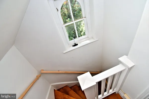 a view of a house with a yard and plants