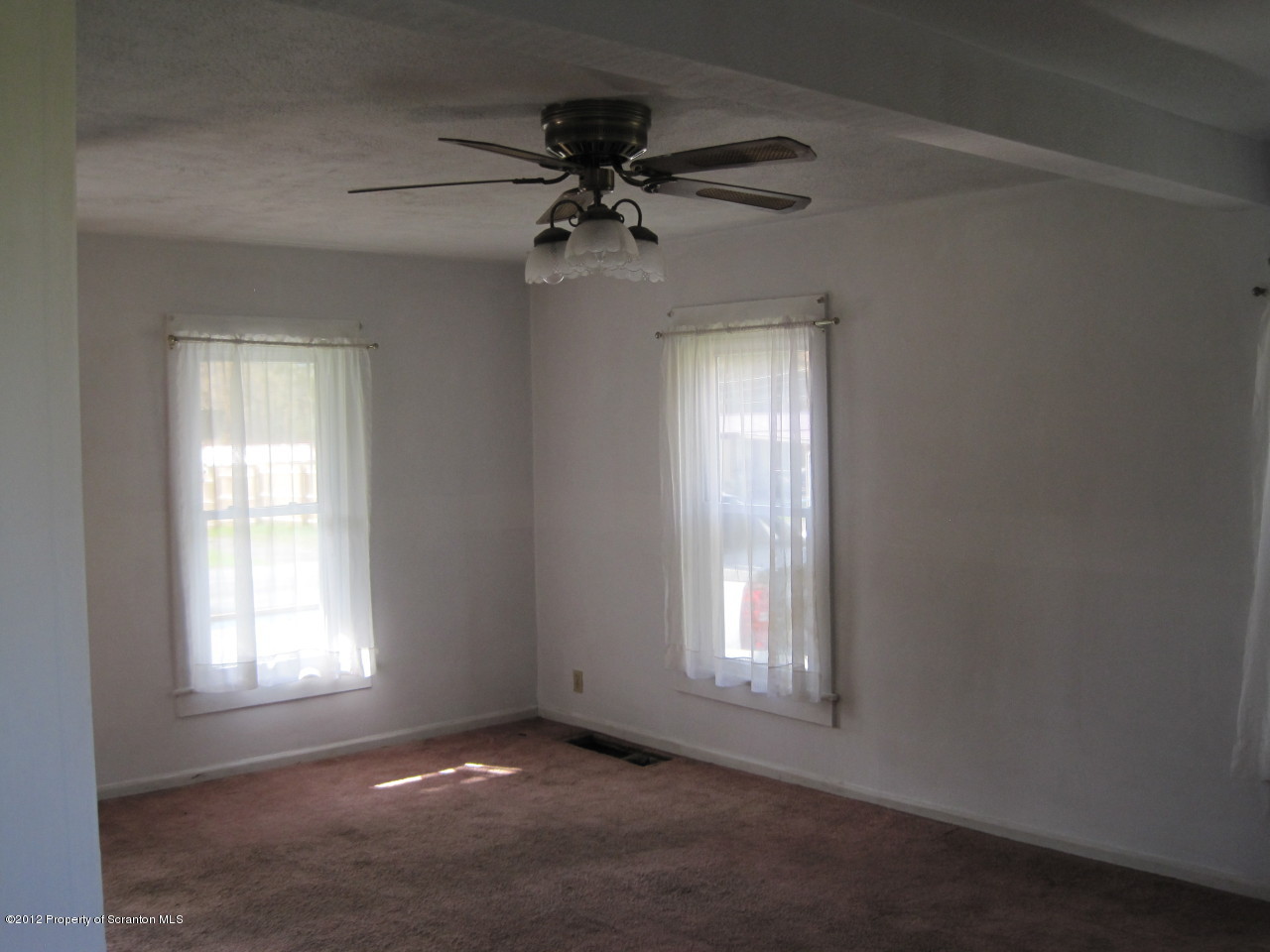 234 Orchard Road Great Bend, PA 18821 - Photo 11 of 21 an empty room that has a window
