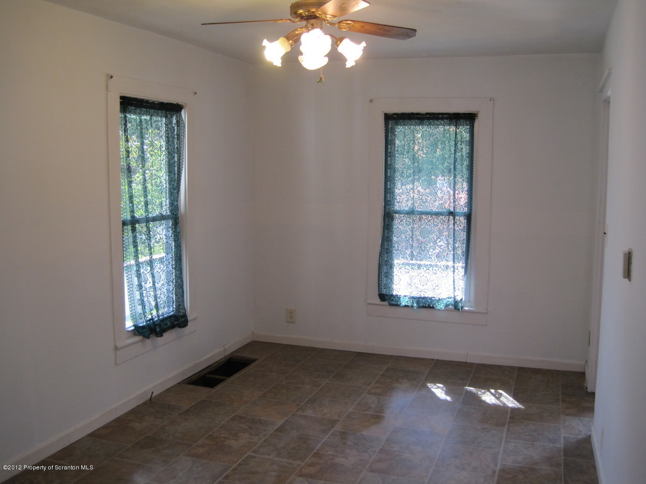 234 Orchard Road Great Bend, PA 18821 - Photo 12 of 21 an empty room that has a window