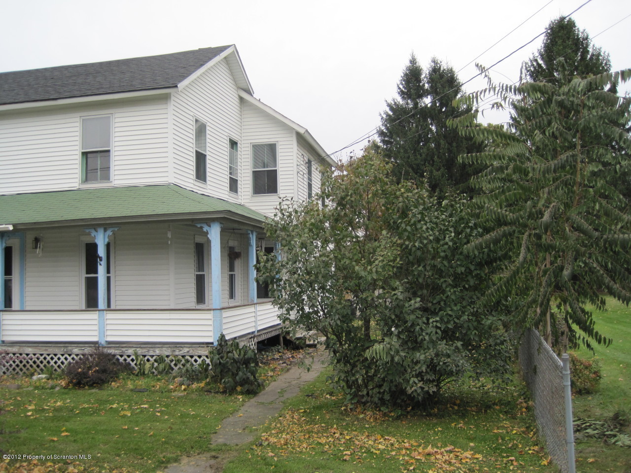 234 Orchard Road Great Bend, PA 18821 - Photo 2 of 21 a front view of a house with a garden