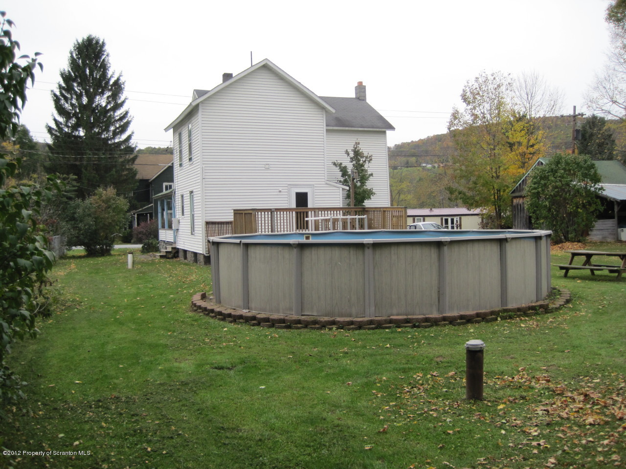 234 Orchard Road Great Bend, PA 18821 - Photo 7 of 21 a front view of a house with a yard