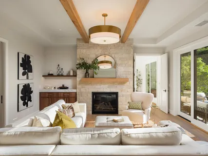 a bedroom with a bed and a fireplace