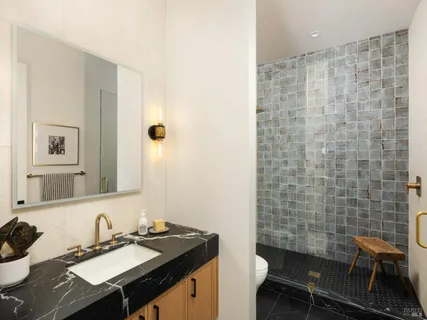 a kitchen with a sink and cabinets