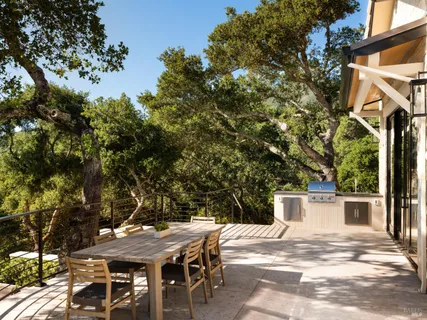 a view of swimming pool with chairs