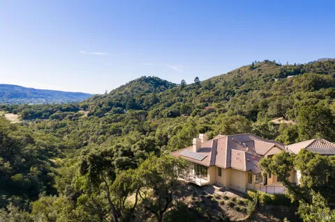 an aerial view of residential house with outdoor space