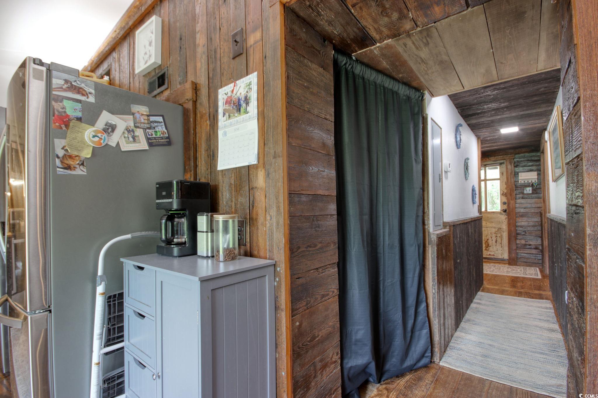 325 Orange Street Georgetown, SC 29440 - Photo 18 of 26 Corridor featuring wooden walls, wood finished flo