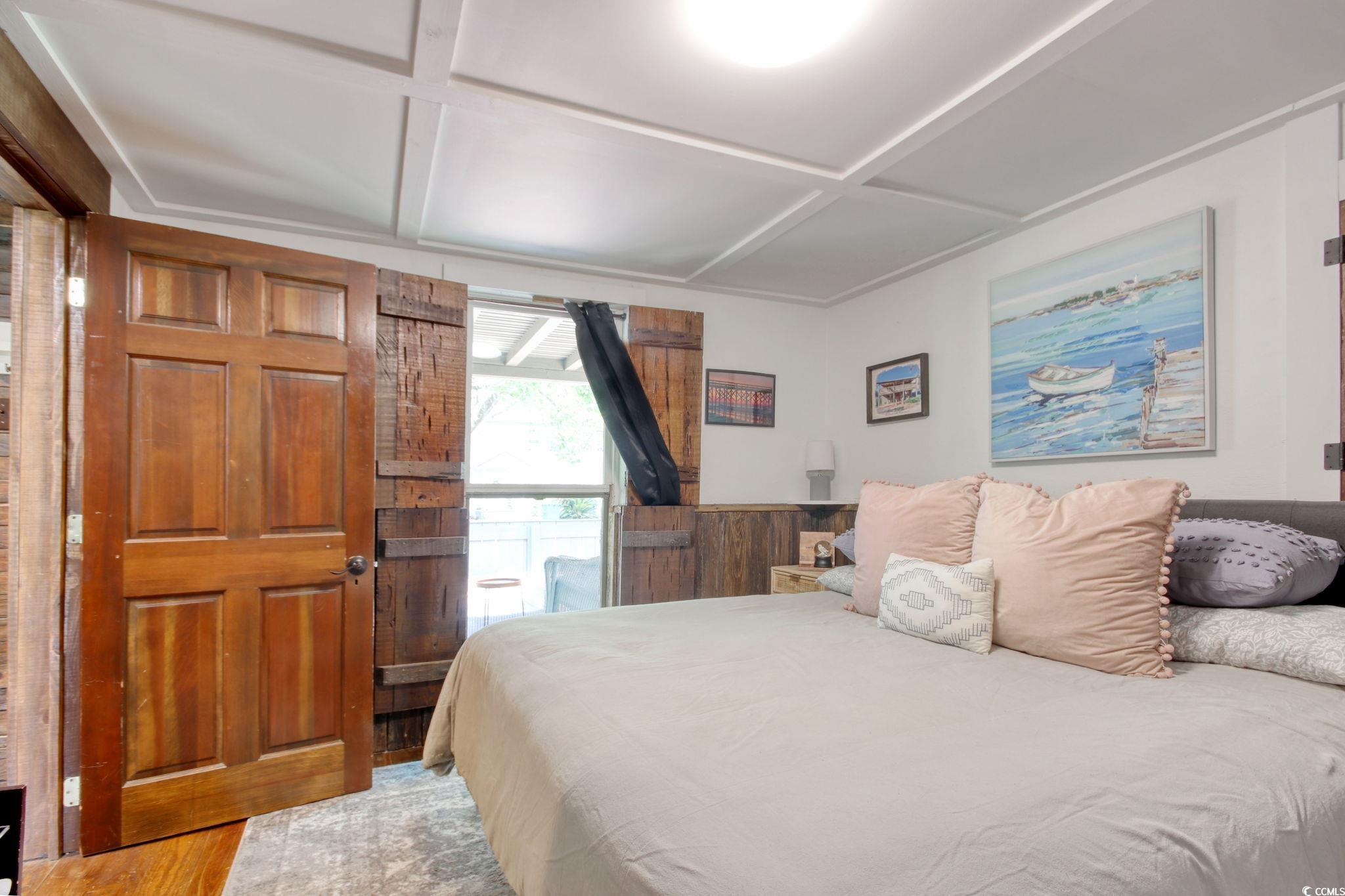 325 Orange Street Georgetown, SC 29440 - Photo 6 of 26 Bedroom with coffered ceiling and light wood-type