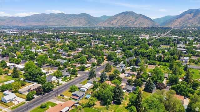 395 North 400 West Logan, UT 84321 - Photo 38 of 48 Expansive residential area featuring established homes, mature trees, and paved streets, framed by distant mountains