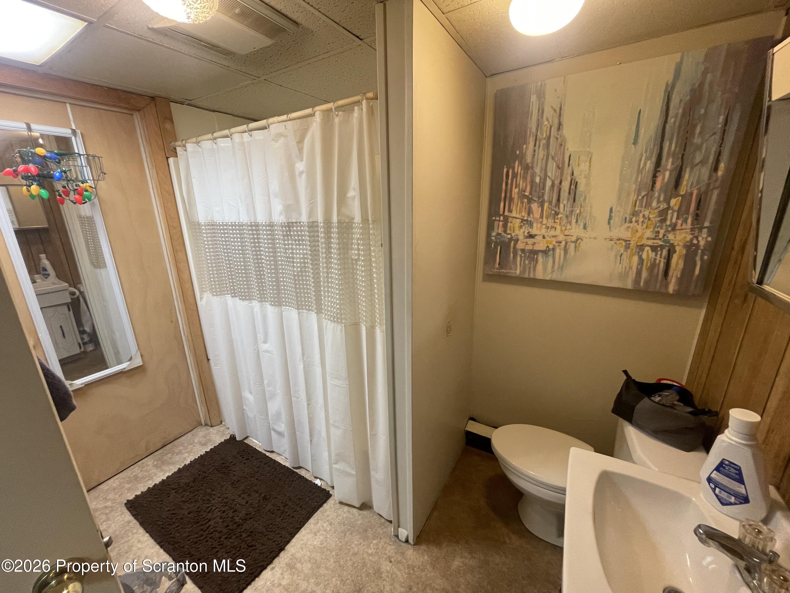 238 George Street Moosic, PA 18507 - Photo 21 of 23 a view of a room with lots of furniture and hardwood floor