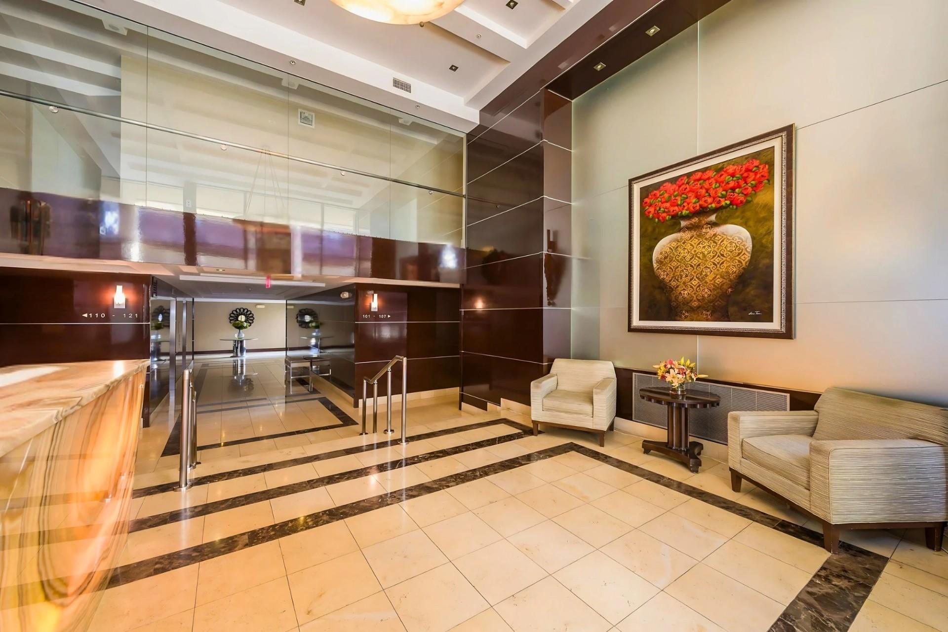 64-05 Yellowstone Boulevard, Unit TH105 Queens, NY 11375 - Photo 22 of 25 a view of living room with furniture and rug