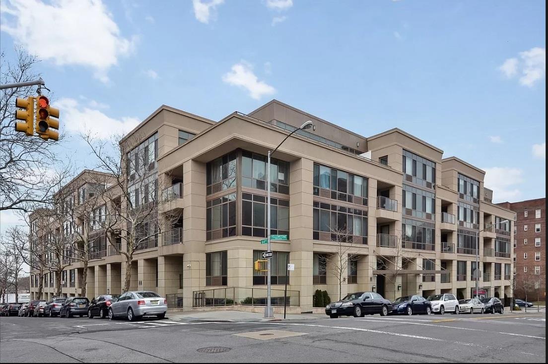 64-05 Yellowstone Boulevard, Unit TH105 Queens, NY 11375 - Photo 24 of 25 a front view of a building