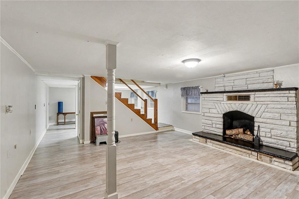 254 County Line Road Fayetteville, GA 30215 - Photo 11 of 51 a view of a livingroom with an empty space and a fireplace