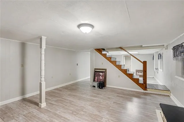 a view of a hallway with staircase