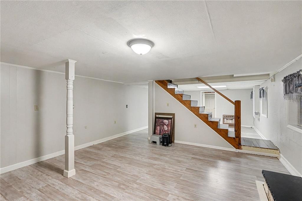 254 County Line Road Fayetteville, GA 30215 - Photo 12 of 51 a view of a hallway with staircase