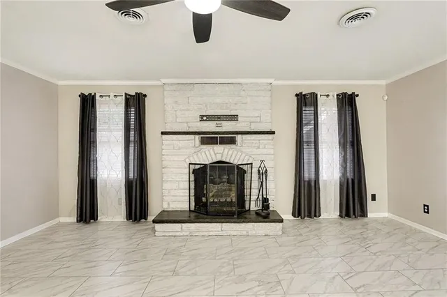 a view of a livingroom with a fireplace