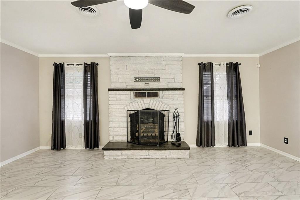 254 County Line Road Fayetteville, GA 30215 - Photo 15 of 51 a view of a livingroom with a fireplace