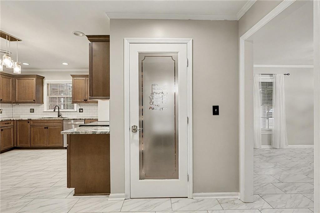 254 County Line Road Fayetteville, GA 30215 - Photo 19 of 51 a kitchen with stainless steel appliances granite countertop a refrigerator and a sink