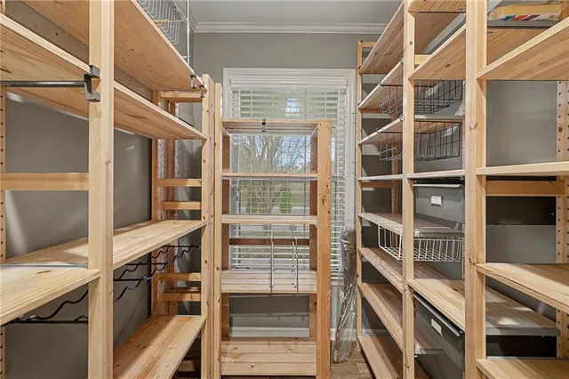 a view of an empty walk in closet