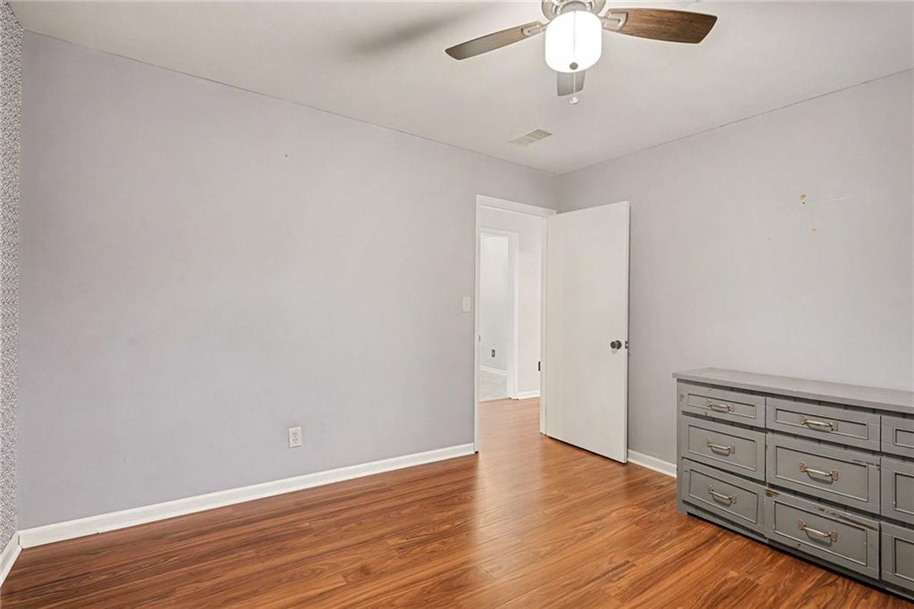254 County Line Road Fayetteville, GA 30215 - Photo 26 of 51 a view of a livingroom with an empty space