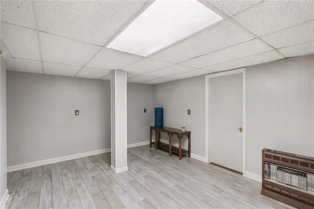a view of a livingroom with wooden floor