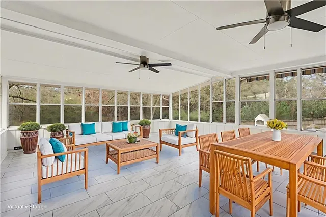 a view of a chairs and table on the terrace