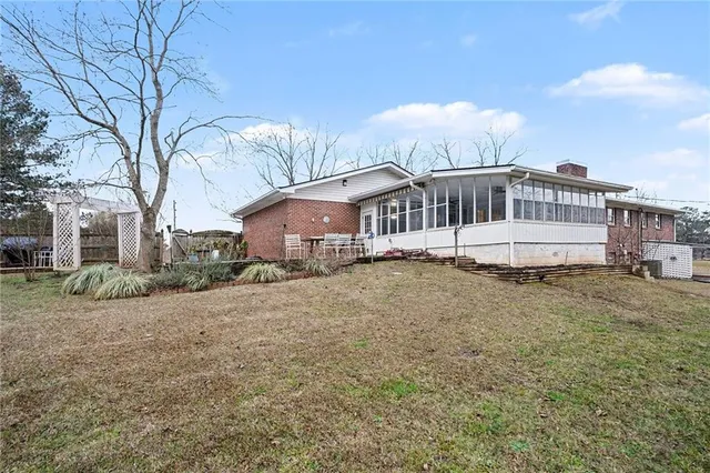 a house view with a garden space