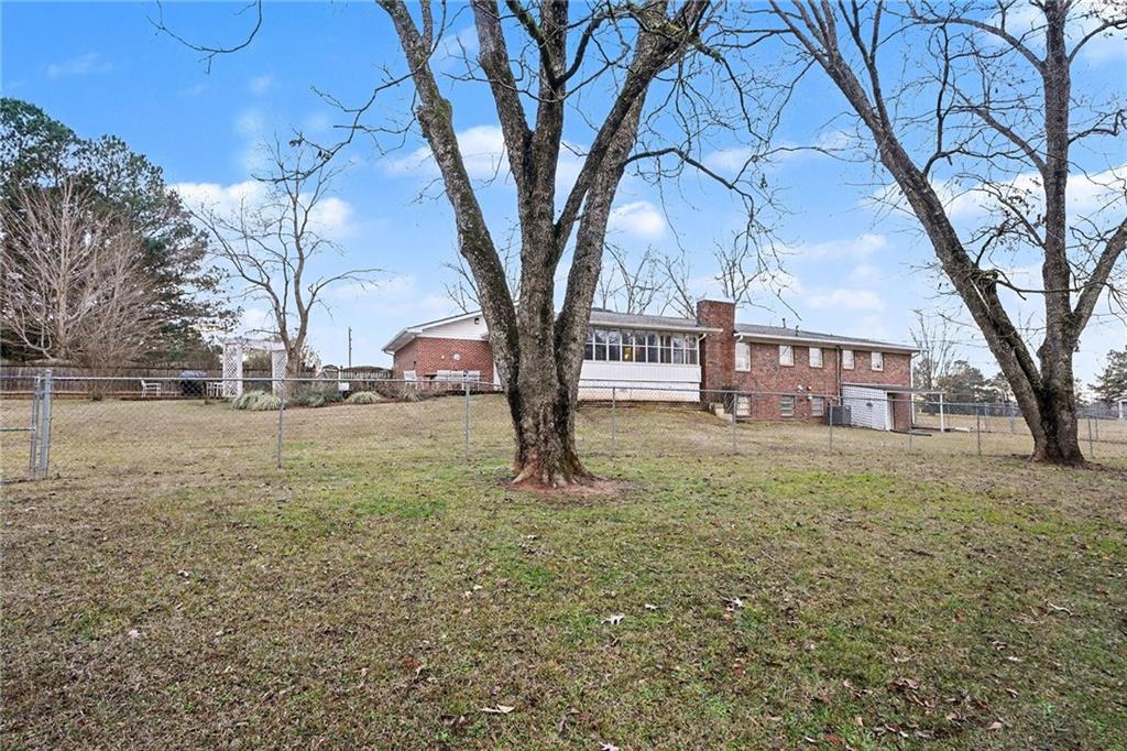 254 County Line Road Fayetteville, GA 30215 - Photo 51 of 51 a view of yard with trees