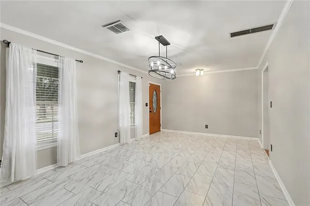 a view of a chandelier in a room with a chandelier