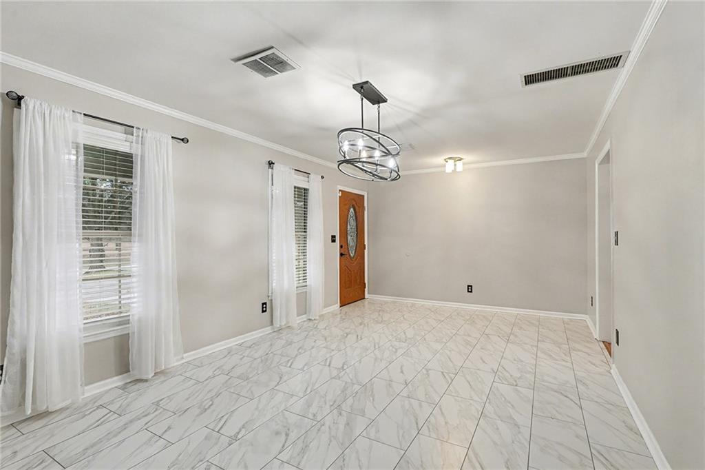 254 County Line Road Fayetteville, GA 30215 - Photo 7 of 51 a view of a chandelier in a room with a chandelier
