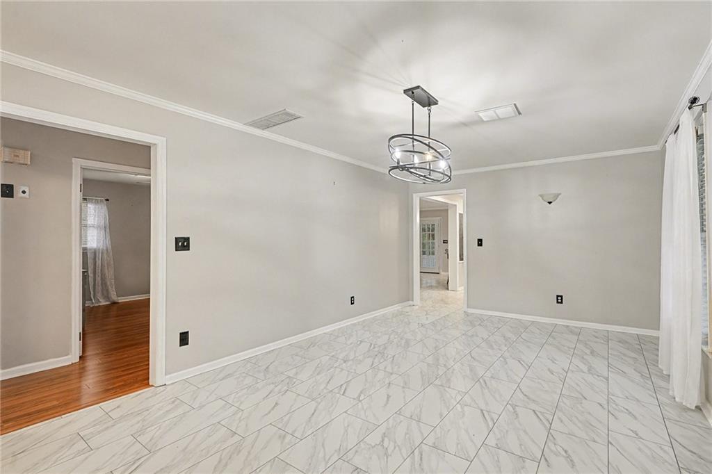 254 County Line Road Fayetteville, GA 30215 - Photo 8 of 51 a view of an empty room with wooden floor