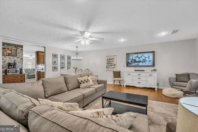 a living room with furniture and a view